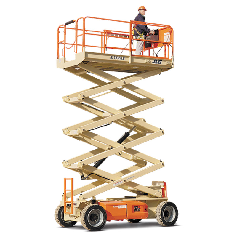 Scissor lift working inside warehouse