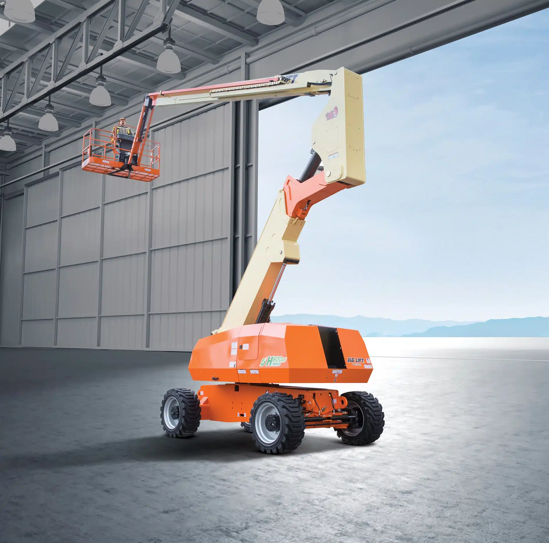 Boom lifts ready in rental yard